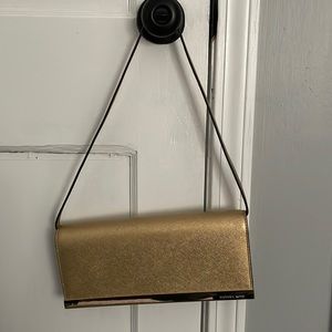Michael Kors Tilda clutch in GOLD color